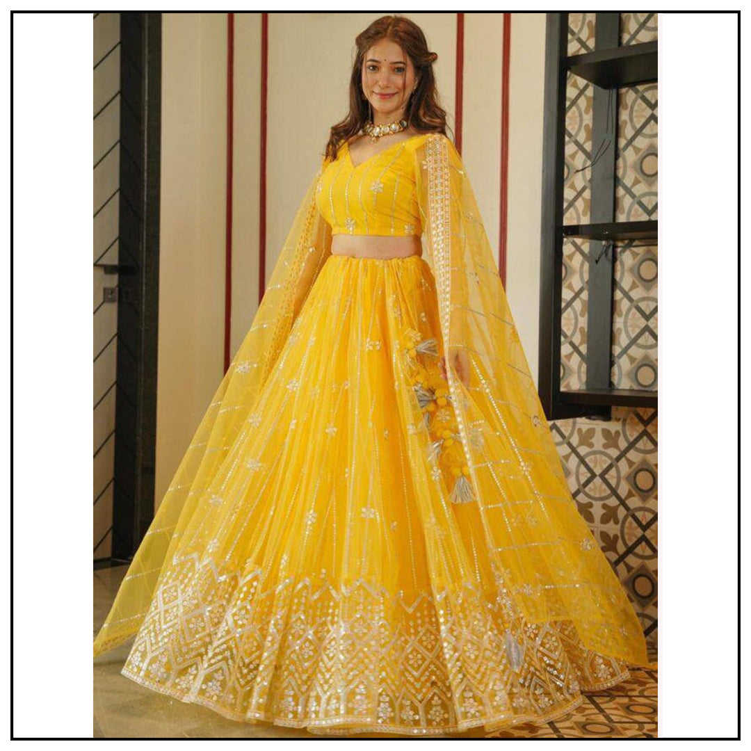 Yellow soft net sequence embroidery work haldi ceremony lehenga choli